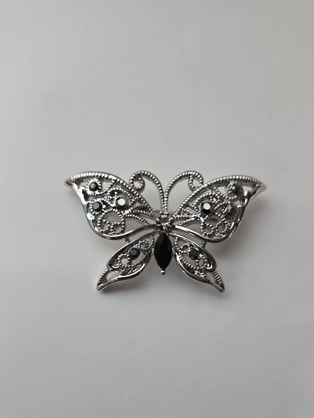 Vintage Silver Tone Butterfly Brooch with Black Stones